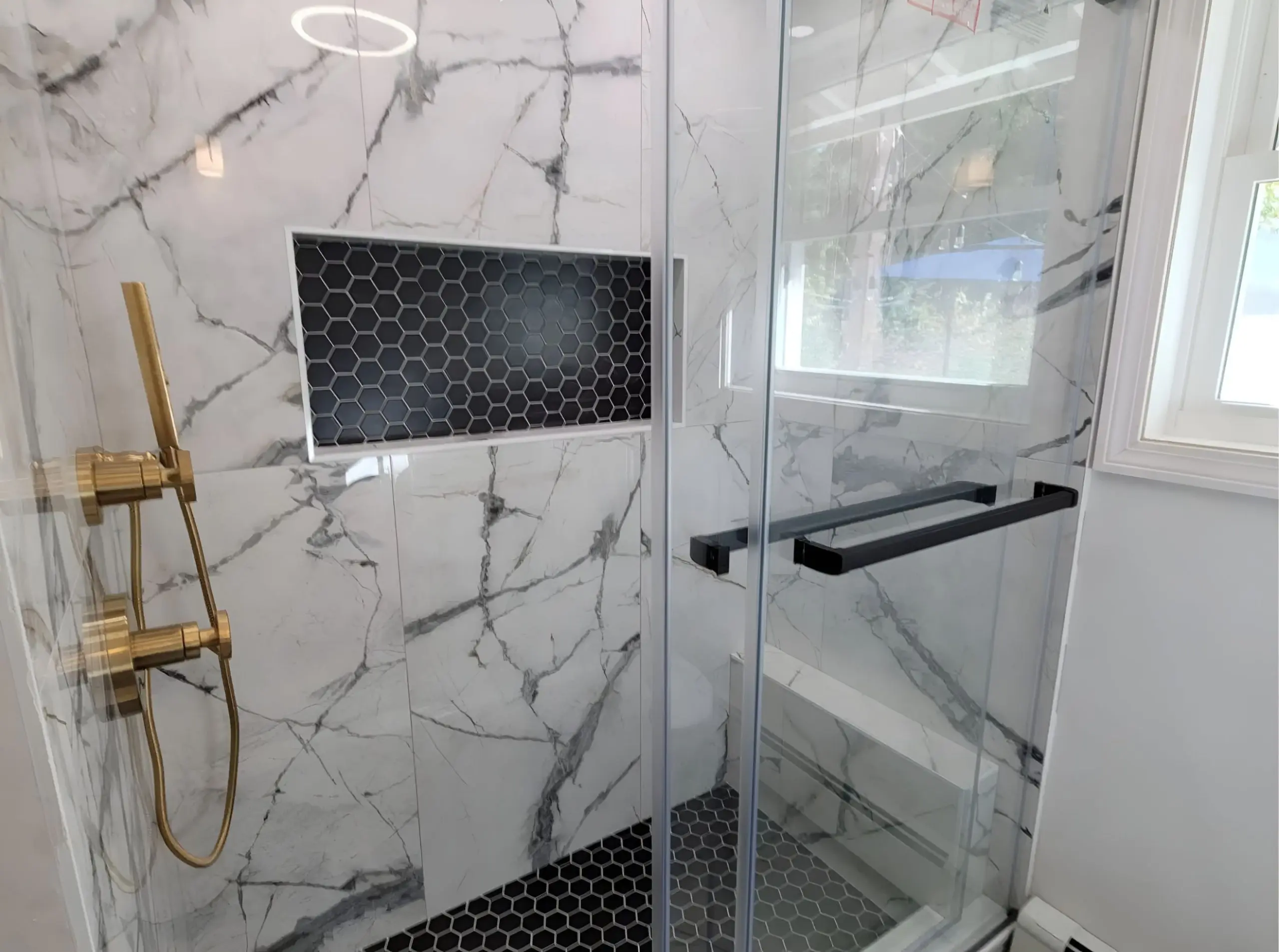 Modern bathroom remodel with gold shower