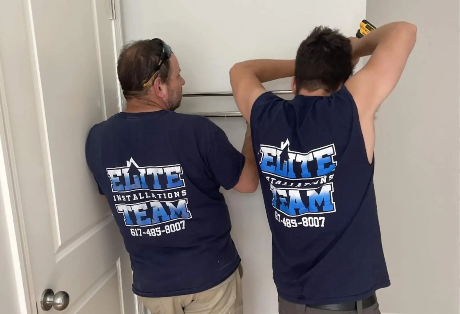two men in matching shirts