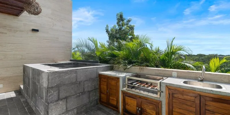 Create Year Round Fun With an Outdoor Kitchen Fire Feature