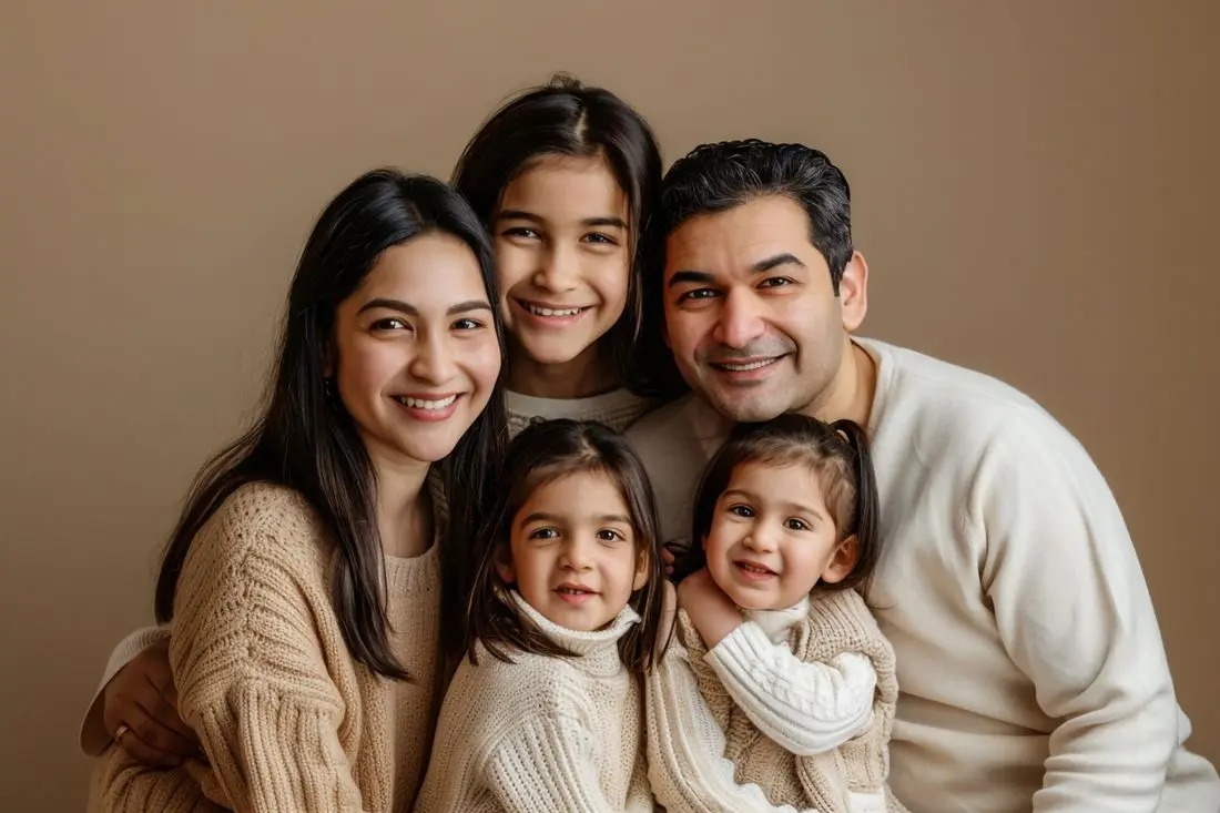 Loving family portrait beige tone background warm interactions