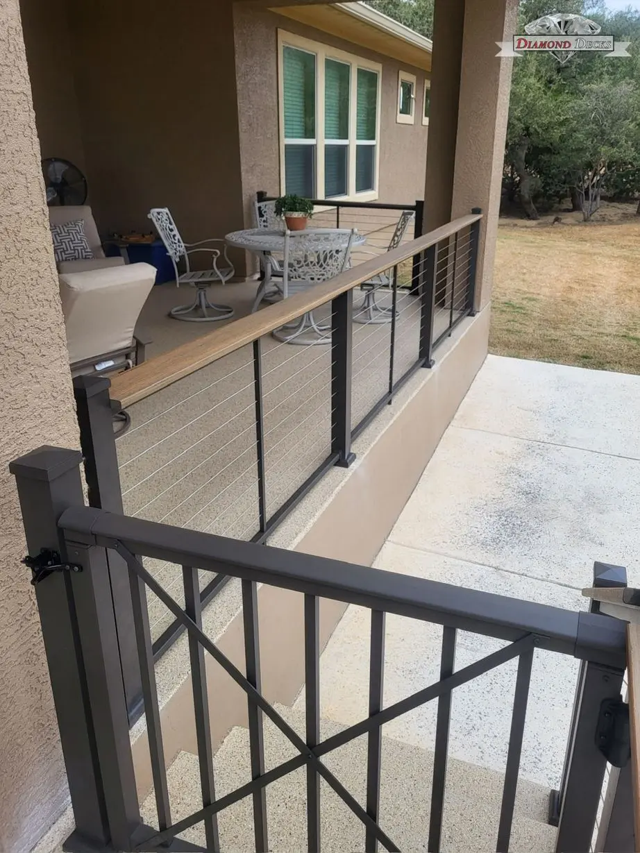Outdoor railing installation by Diamond Decks