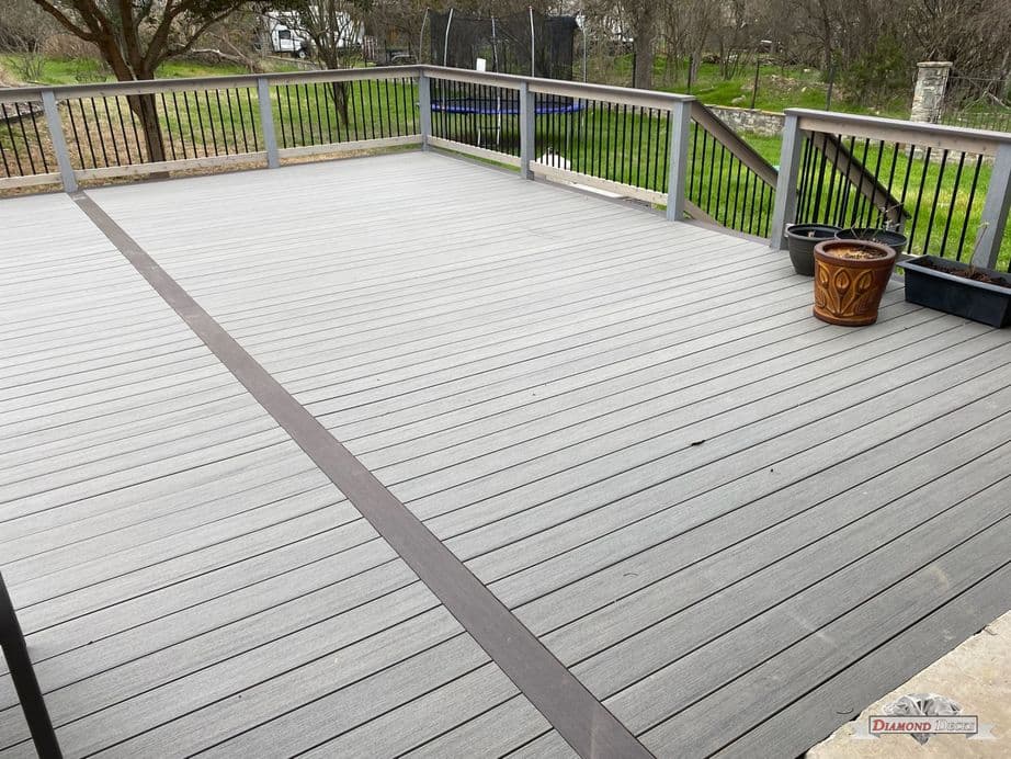 Outdoor railing installation by Diamond Decks