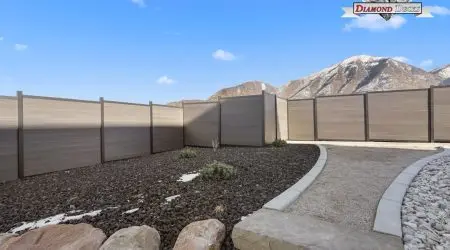 Composite privacy fence project by Diamond Decks