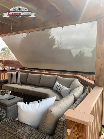 Motorized patio sun shade by Diamond Decks