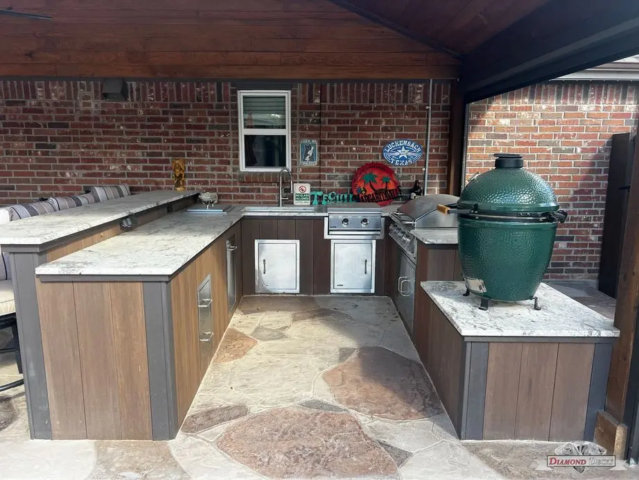 U-shaped kitchen with quartz counters and Big Green Egg by Diamond Decks in San Antonio, TX