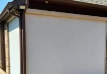 Motorized patio sun shade by Diamond Decks