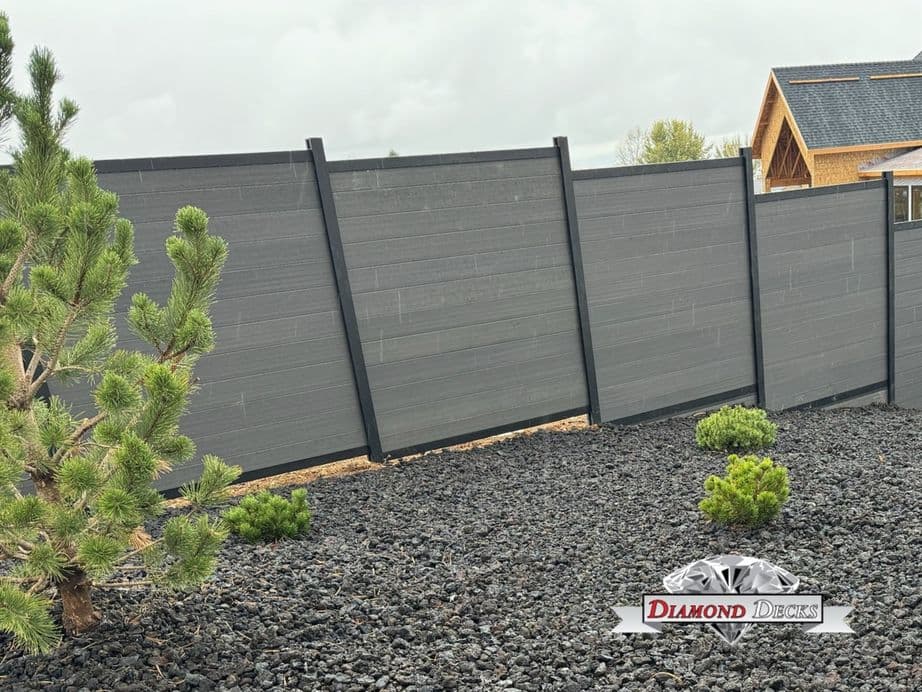 Horizontal gray composite privacy fence panels installed by Diamond Decks, San Antonio, TX