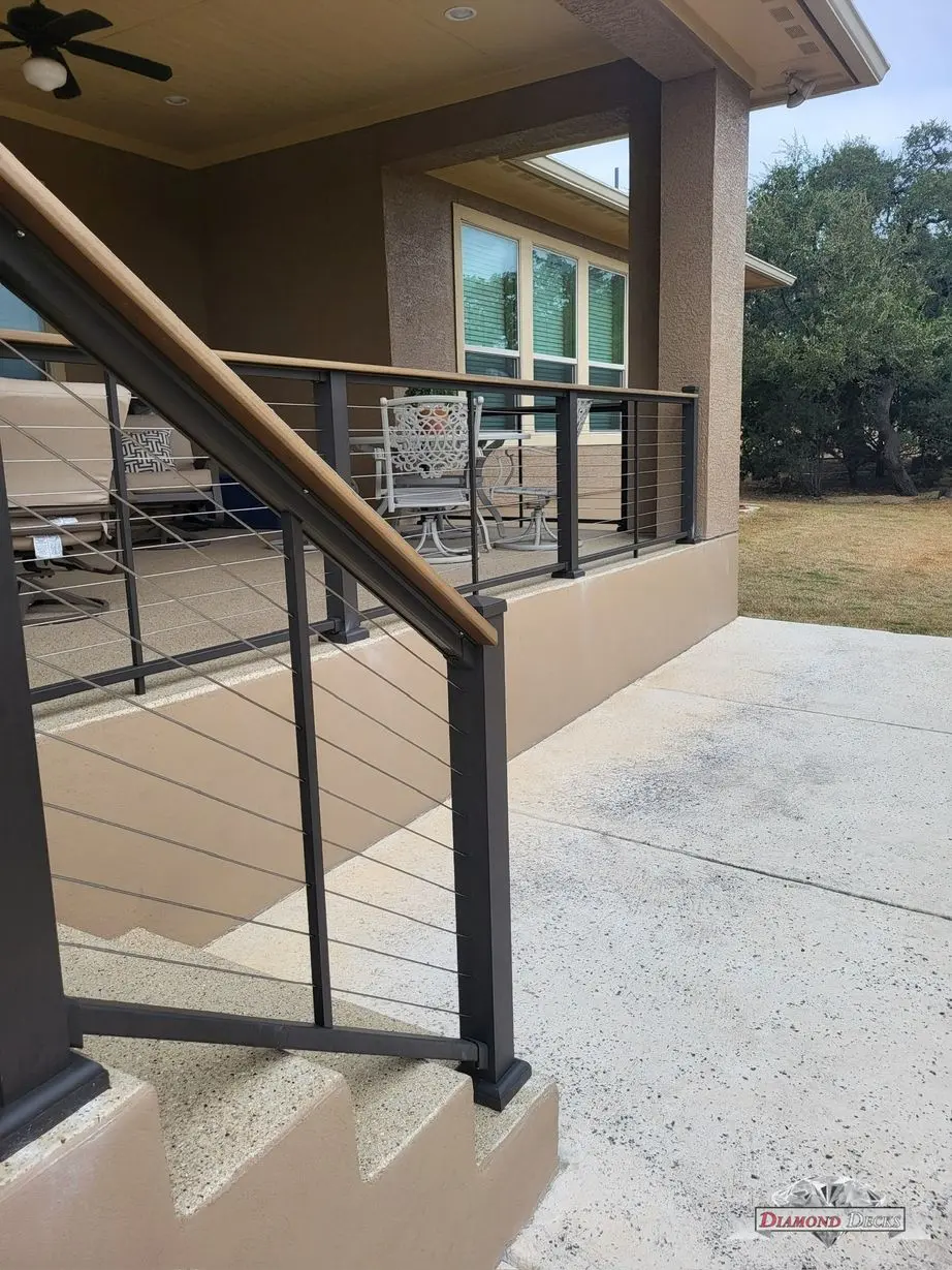 Outdoor railing installation by Diamond Decks