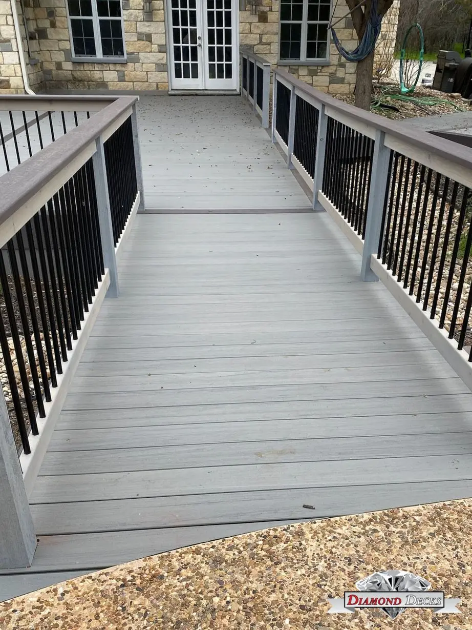 Outdoor railing installation by Diamond Decks