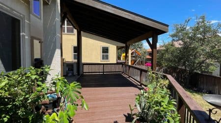 Wood patio cover over a backyard deck by Diamond Decks, San Antonio, TX