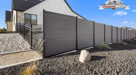 Composite privacy fence project by Diamond Decks
