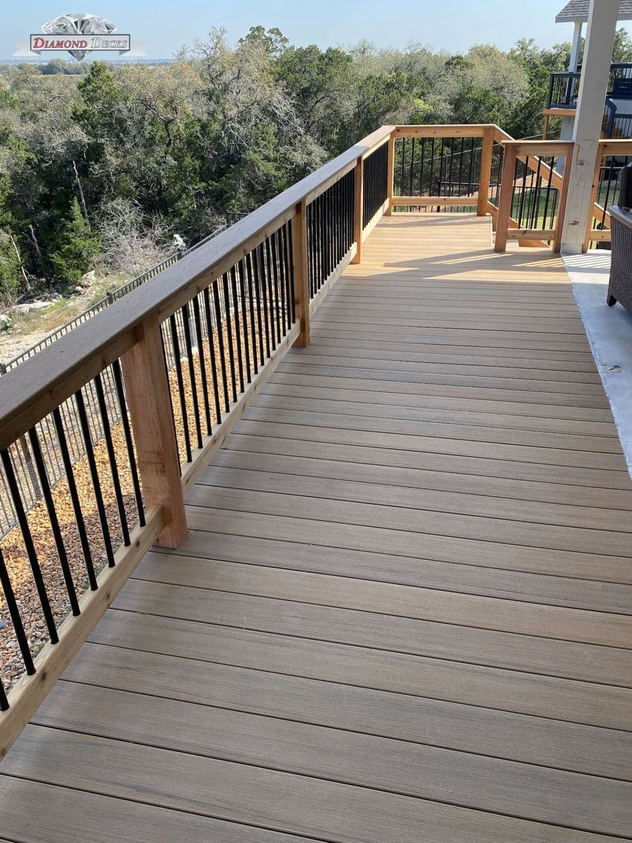 Outdoor railing installation by Diamond Decks