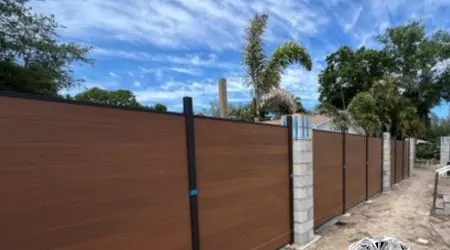 Composite privacy fence project by Diamond Decks