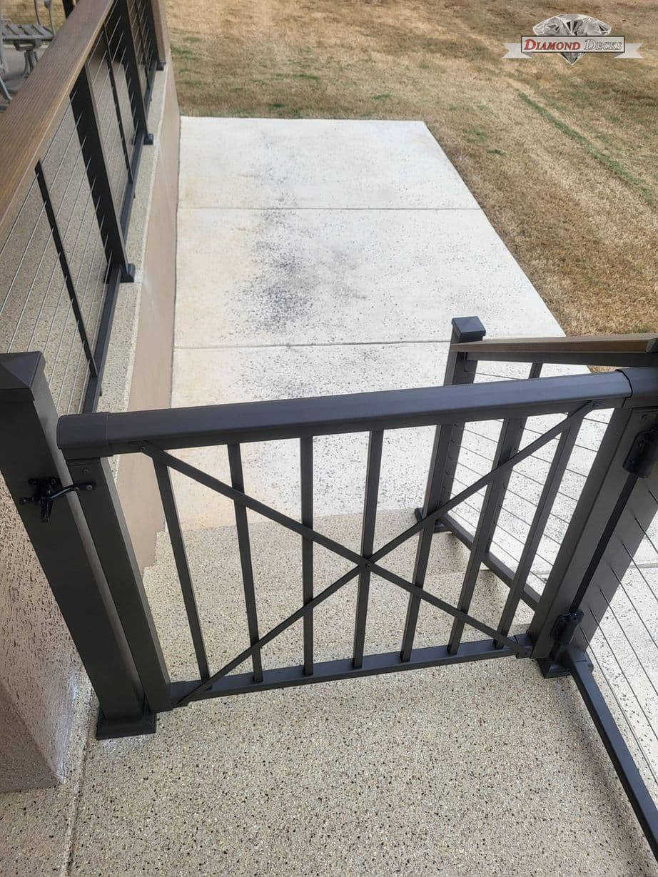 Outdoor railing installation by Diamond Decks