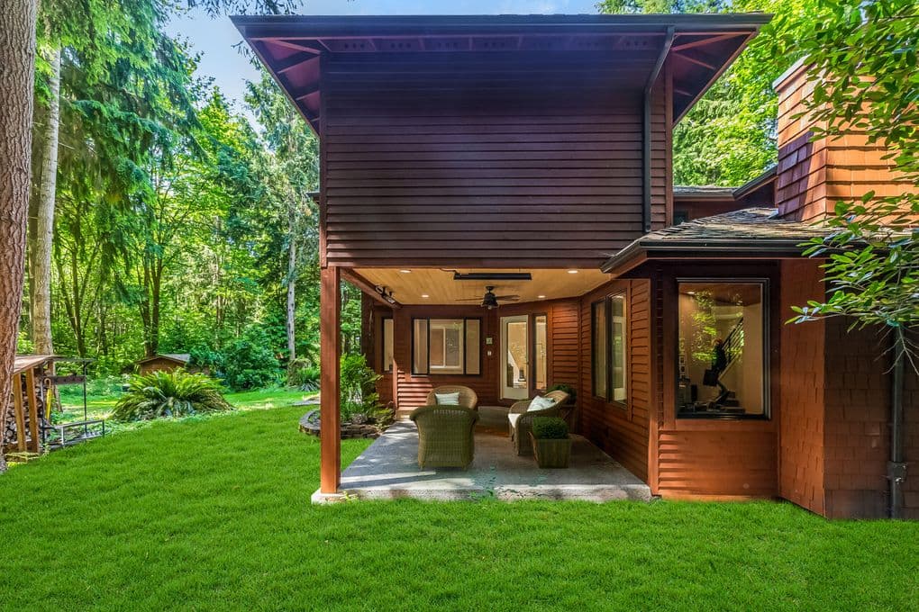 Zhang home addition in Redmond, WA with cedar siding and covered outdoor living room Zhang home addition in Redmond, WA with cedar siding and covered outdoor living room