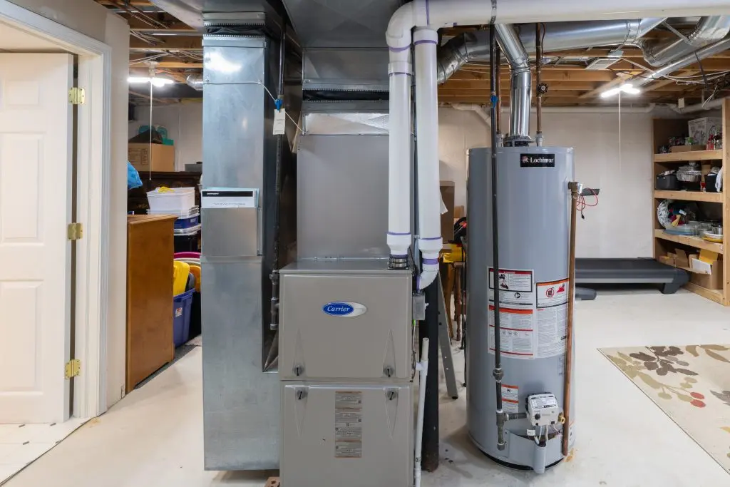 home has been updated with a new residential furnace and hot water tank installed in the basement