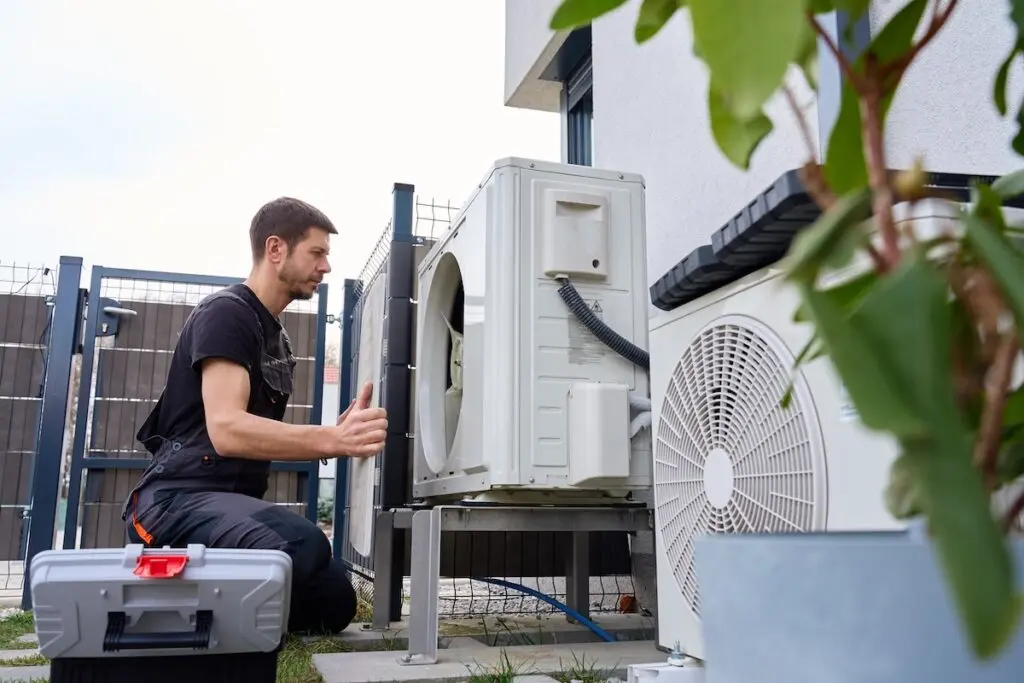 Technician performing maintenance hvac