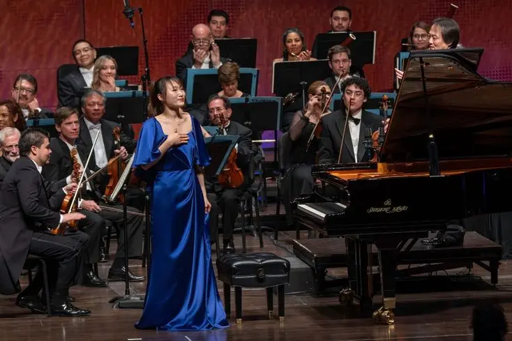 Yungyung Guo of China stands for applause during Round IV of The Gurwitz 2024 International Piano Competition