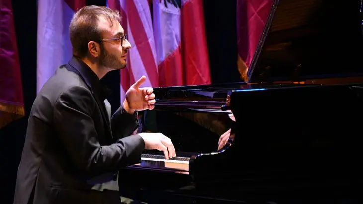 Two men performing onstage