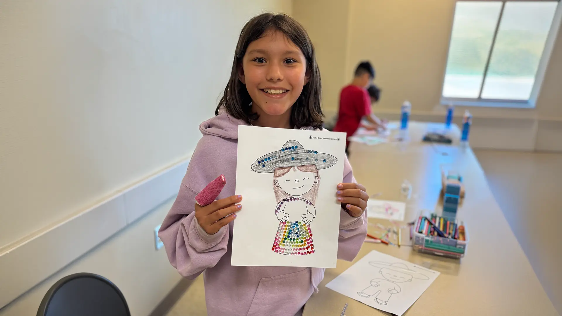 Child holding craft