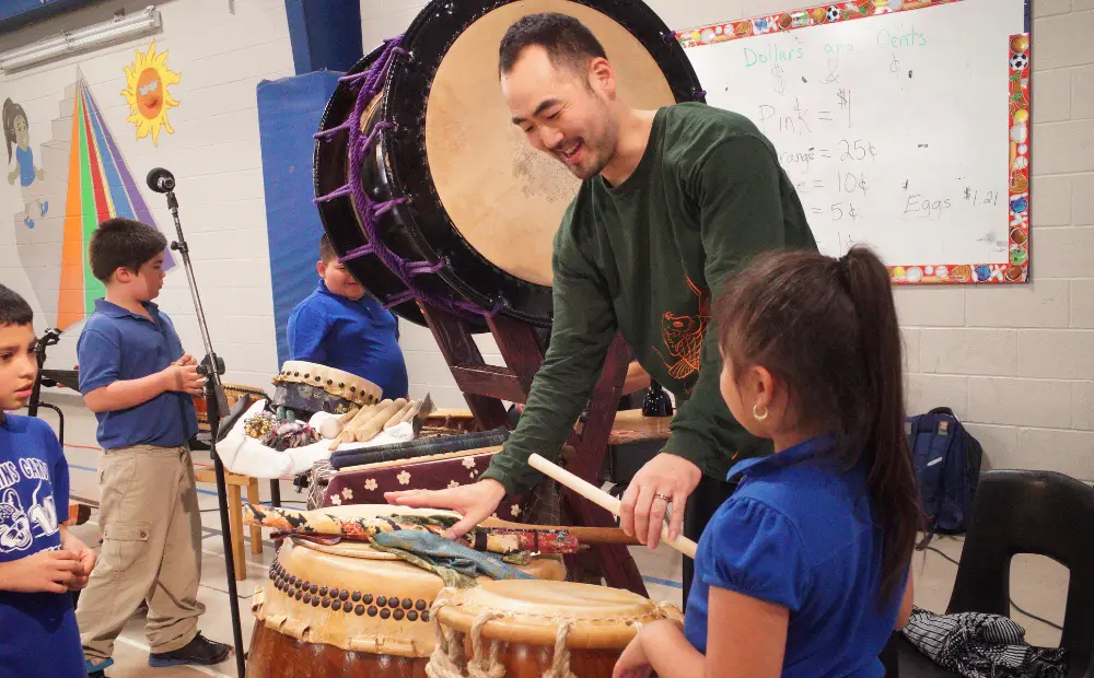 Music Teacher with a Student