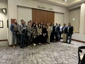 A group of people pose for a photo.