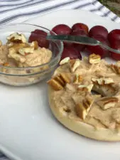 Pecan Praline Honey Butter spread on bagel.