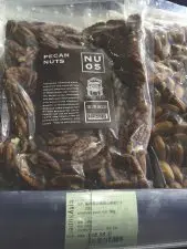 Vacuum-packed pecan halves on shelves in Shanghai’s Citysuper grocery store.