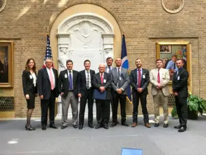 The group of pecan industry representatives stand together outside the USDA building in Washington, D.C.