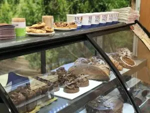 A bakery display with pecan-centric pastries.