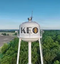 Photo courtesy of ProvisionUS, featuring the newly painted Keo Water Tower with our signature pecan-in-the-O logo.