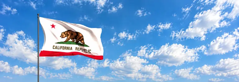 California Flag Billowing Under Blue Skies California Flag Billowing Under Blue Skies