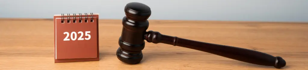 Judge's hammer or gavel and calendar 2025