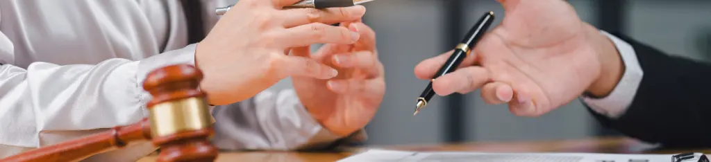 Attorneys or lawyer reading statute of limitations, consulting between male lawyers and business clients, tax firms and examining contract documents in business before signing