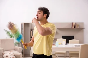 Man about to sneeze