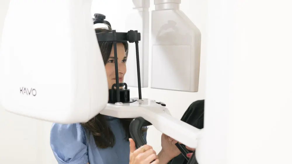 Female patient at Danos Dental with cone beam scanner in Murfreesboro, TN