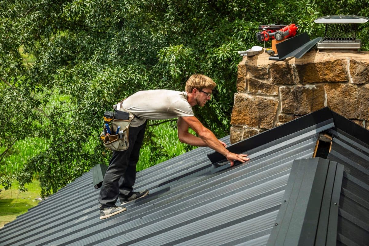 chimney flashing repair dark grey metallic roof