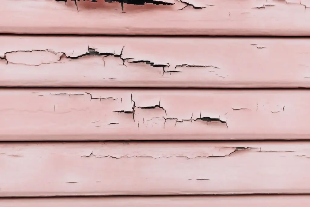 what does hail damage look like on siding pink paint cracking up