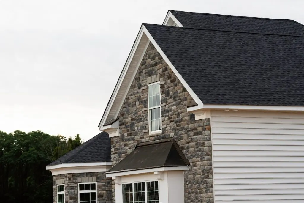 how to get insurance to pay for roof replacement edge of roof shingles on top of the house dark asphalt tiles on the roof background color