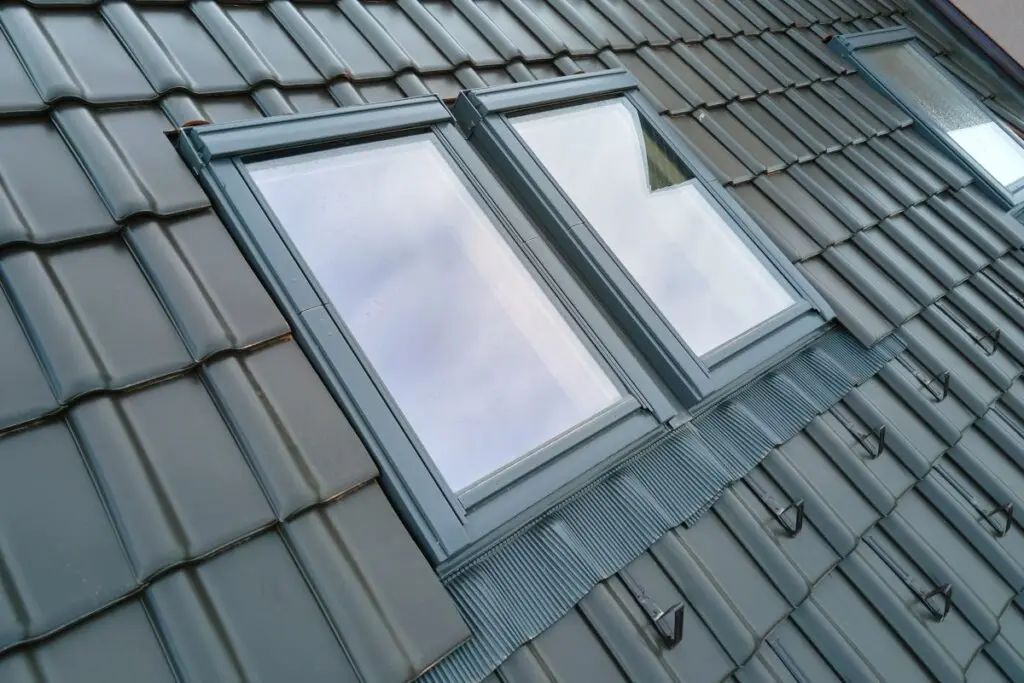 skylight installation close up metallic tiles
