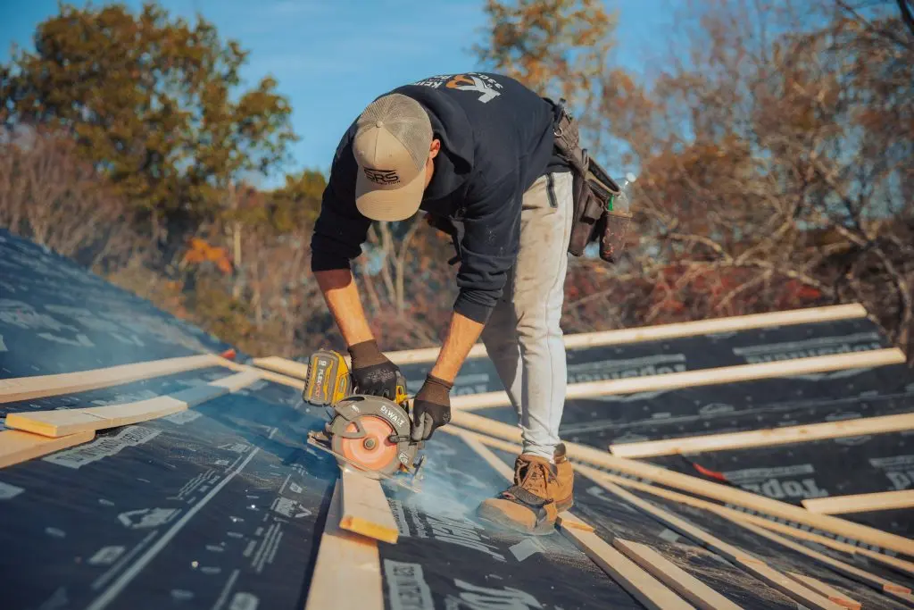 ice and water shield guy repairing roof