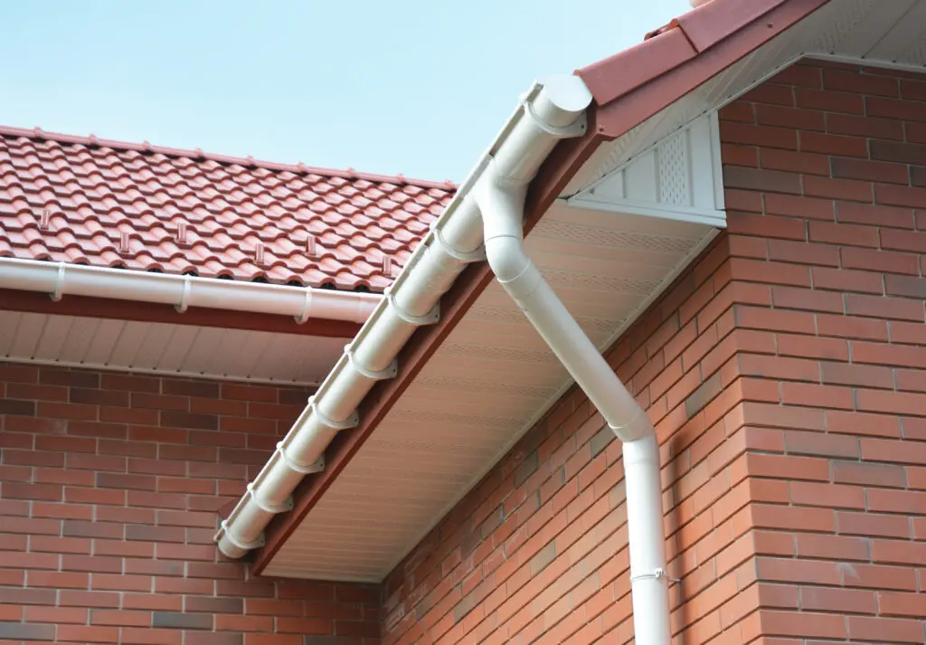 Close up view on House Problem Areas for Rain Gutter Waterproofing Outdoor. Home Guttering, Gutters, Plastic Guttering System, Guttering & Drainage Pipe Exterior