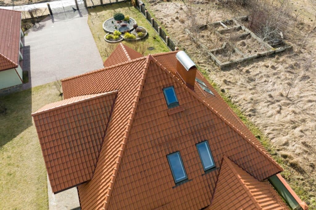 skylight installation 3 vents on the roof orange tiles big house