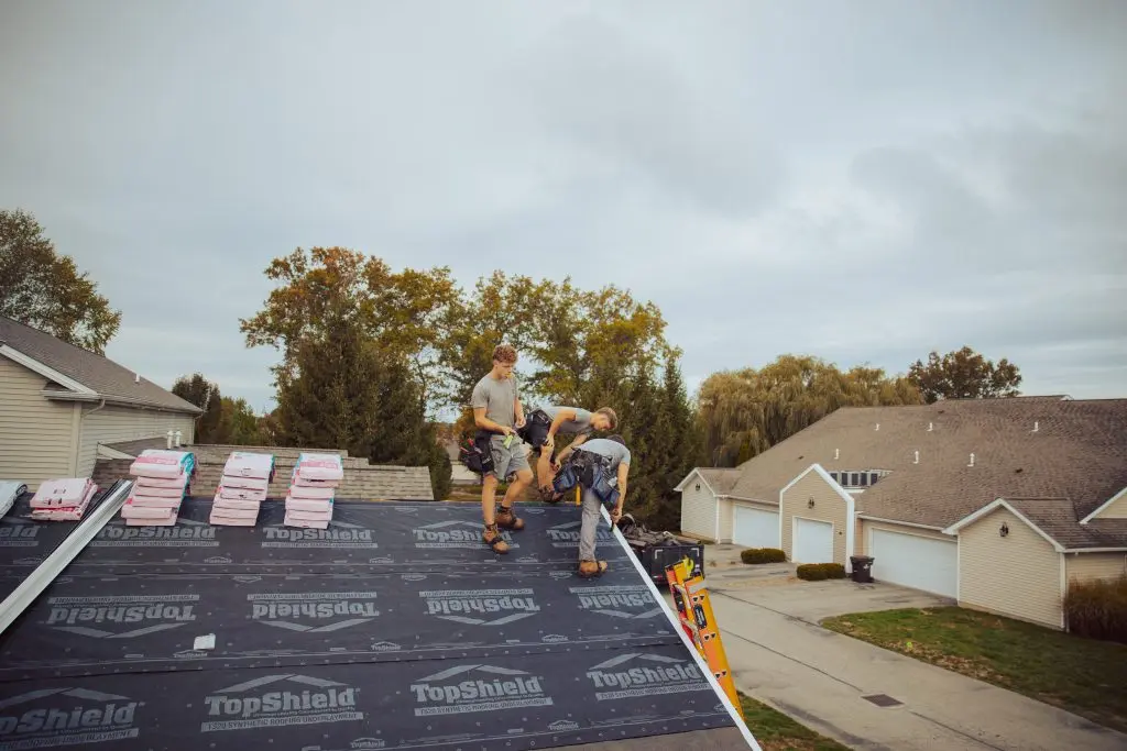 topshield installation guys fixing roof