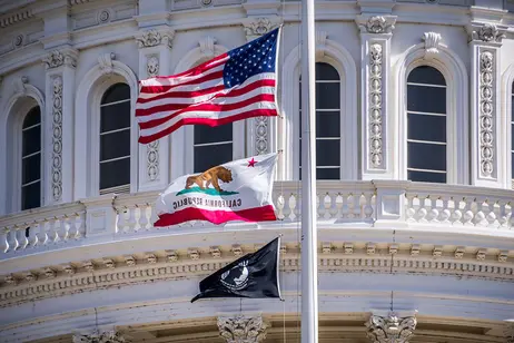 Sacramento Capitol dome and California state flag