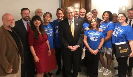 Creators thanking Senator John Kennedy