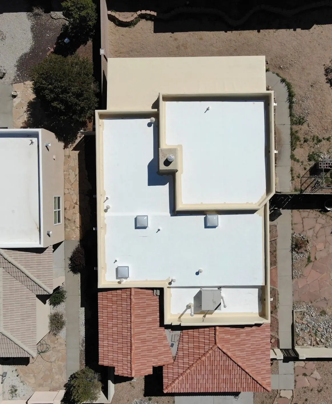 aerial view of tpo and tile roofing
