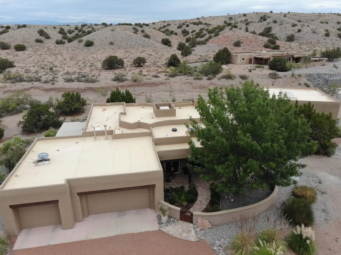 a flat new stucco roof