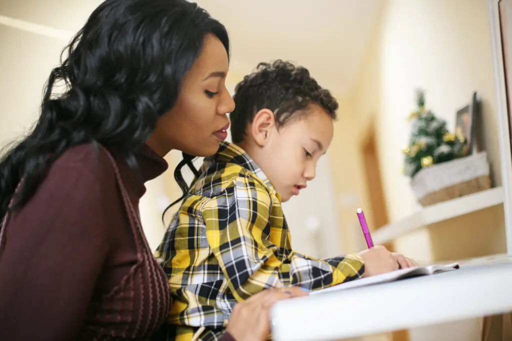 Mom teaching young son