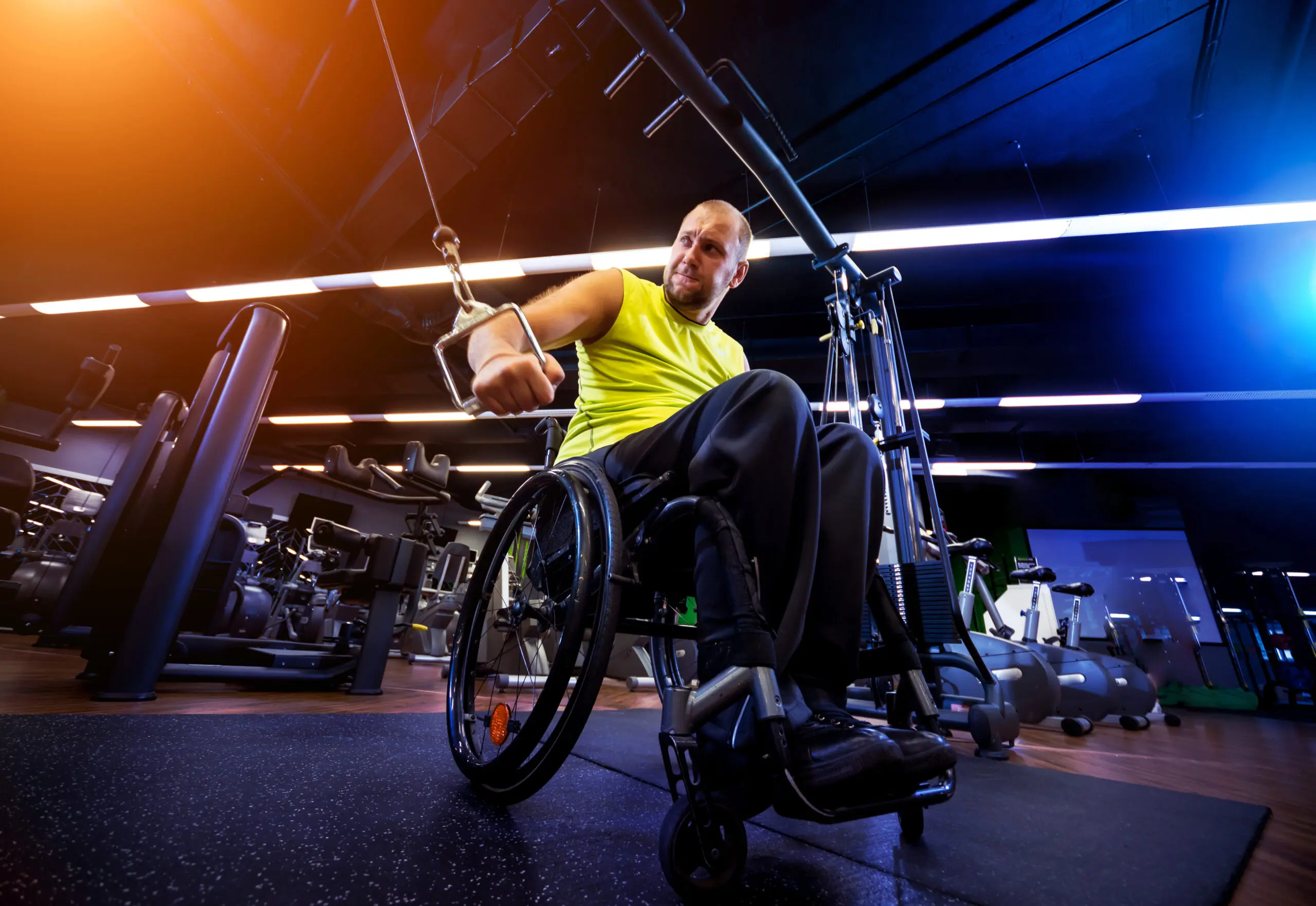 Man in a wheelchair works out